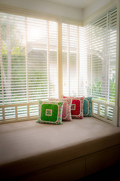 istock colorful pillows on modern day bed 496063554