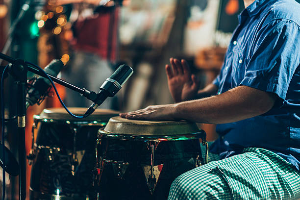 Percussionist Percussionist at concert latin music photos stock pictures, royalty-free photos & images