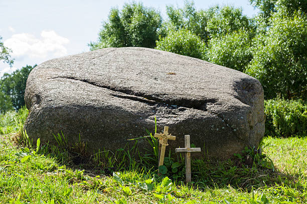 istock stone with crucifixions near it 496065902
