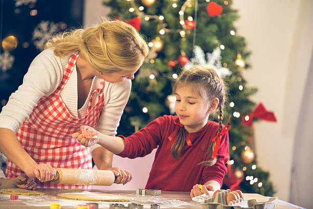 istock Mother and daughter baking Christmas cookies 496066110
