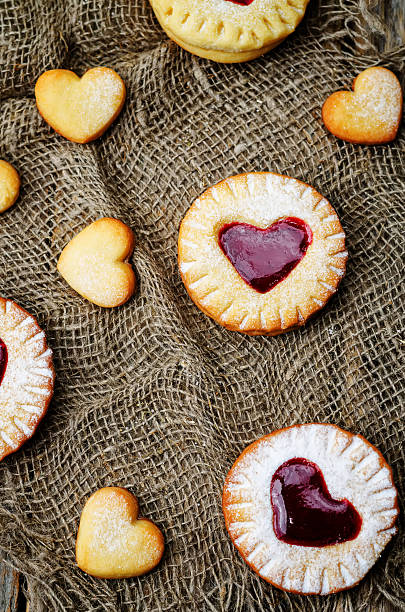 istock Shortbread with the shape of a heart and berry jam 496066552