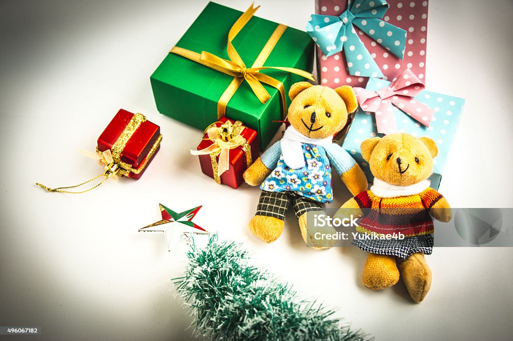 Christmas decoration with Lovely bear Christmas decoration with Lovely bear, a gift,  christmas tree, and ribbon 2015 Stock Photo