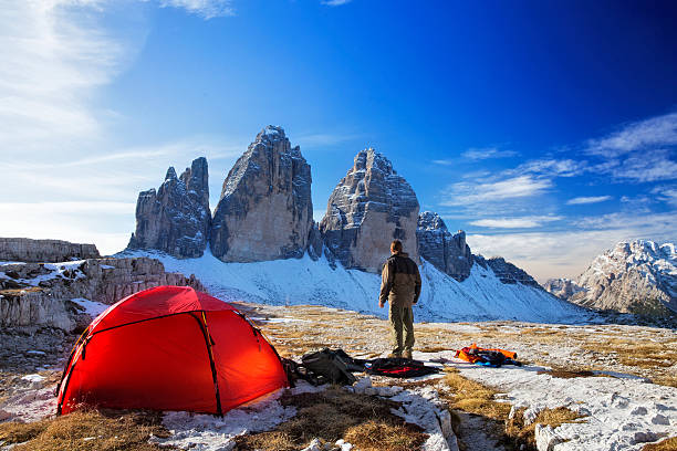 Lonely  Photographer with tent at the three Pinnacles in wintertime