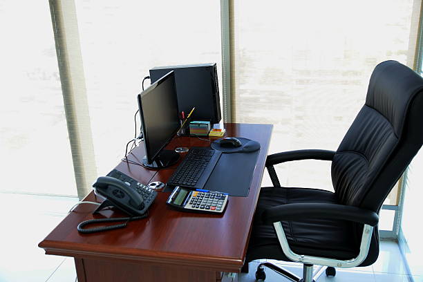 istock Office desk with computer and other items in the day 496069576