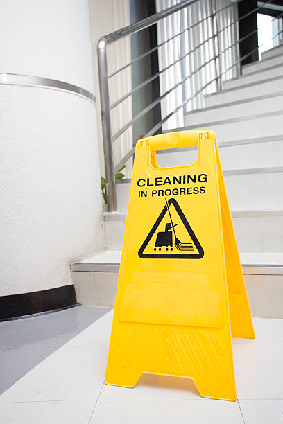 istock cleaning progress caution sign showing in an office 496070078