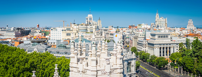 View from the roof of the Palacio de Comunicaciones overlooking the busy Plaza de Cibeles towards the heart of central Madrid, Spain's vibrant capital city. ProPhoto RGB profile for maximum color fidelity and gamut.
