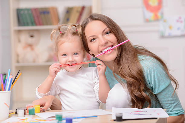 istock Cheerful friendly family is making fun together 496073920