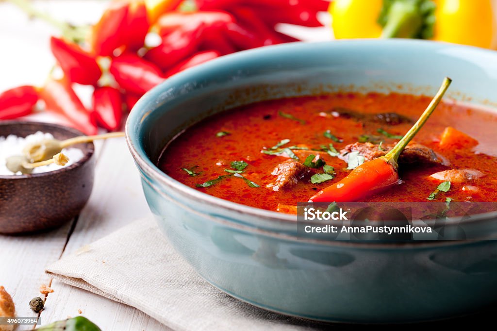 Goulash, beef, tomato, pepper, chili, smoked paprika soup.  Traditional Hungarian dish. Homemade Tomato Soup for Lunch 2015 Stock Photo