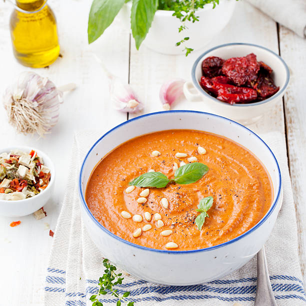 istock Tomato soup with sun dried tomatoes and olive oil 496073996