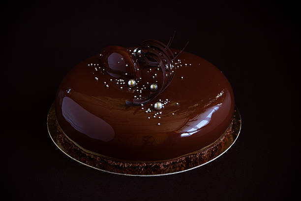 istock Modern cake covered with chocolate glyassazhem. 496074516