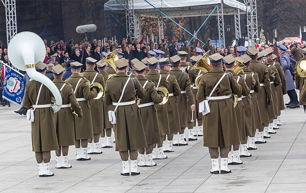 Warsaw, Poland - November 11, 2014:Celebration of the anniversary of the Polish Independence Day in Pilsudski Square, Military Orchestra in the parade, Polish Government in background, Warsaw, Poland 