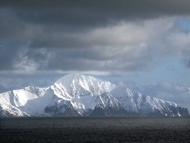 istock Aleutian Islands and Snow Covered Mountains 496075420