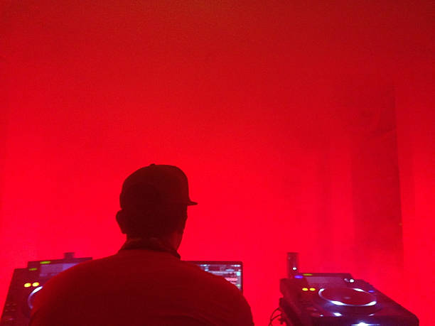 istock DJ mixing beats in nightclub 496092168