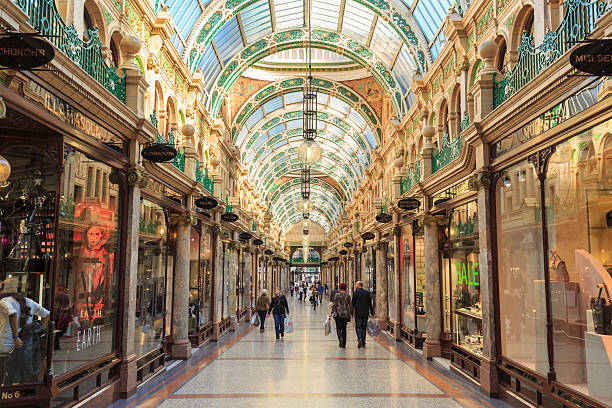 Shoppers walking through County Arcade in Leeds, West Yorkshire stock photo