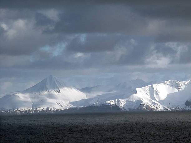 istock Aleutian Islands and Snow Covered Mountains 496093656