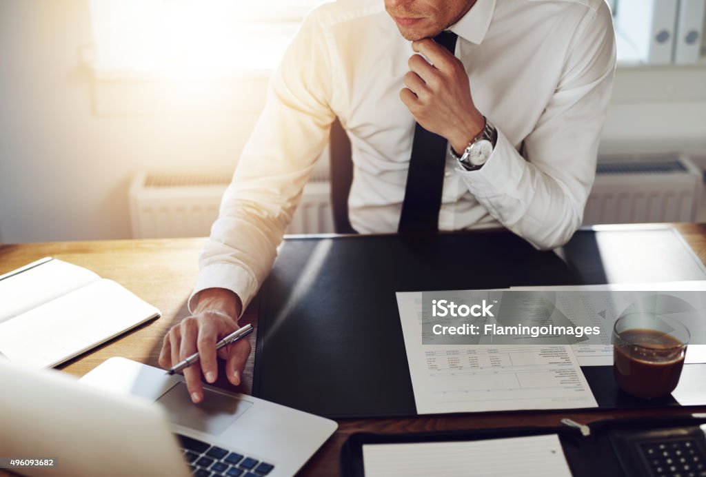 Business man working at office, Consultant lawyer concept Business man working at office with laptop and documents on his desk, consultant lawyer concept Lawyer Stock Photo