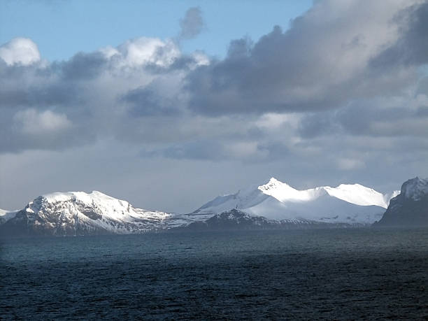 istock Aleutian Islands and Snow Covered Mountains 496093804