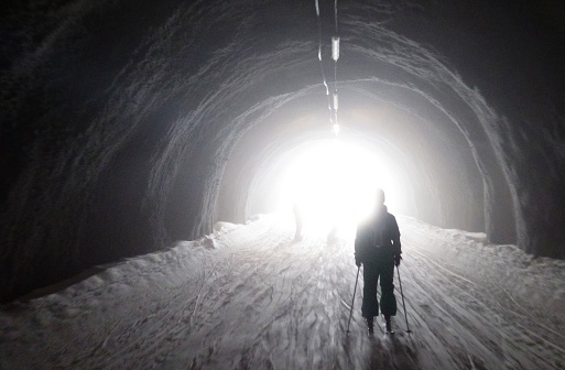 Skier Sees the Light at the End of the Tunnel