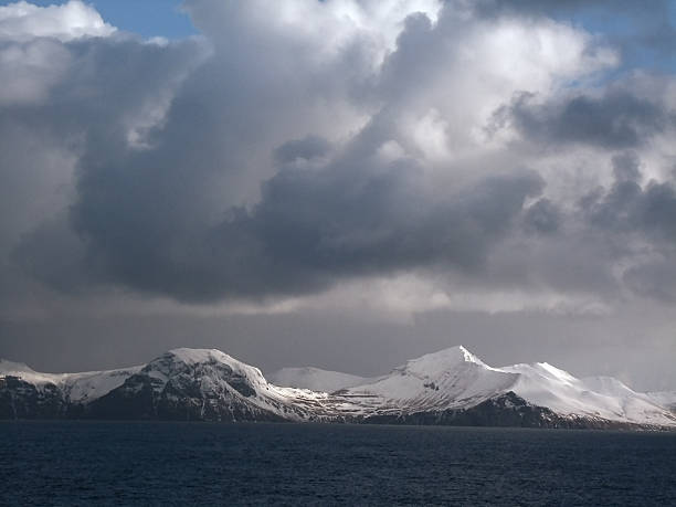 istock Aleutian Islands and Snow Covered Mountains 496097166
