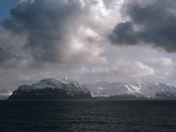 istock Aleutian Islands and Snow Covered Mountains 496097326