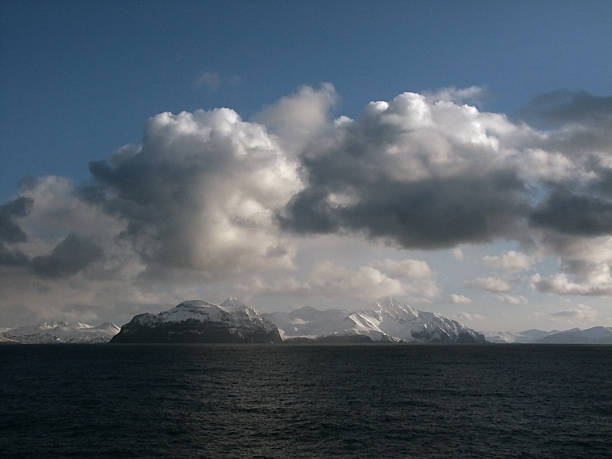 istock Aleutian Islands and Snow Covered Mountains 496099064