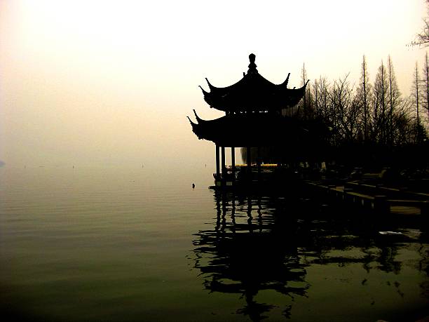 istock Pagoda on Misty Lake 496099370