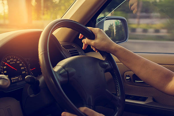 istock Female driving car. Vintage filter 496101264