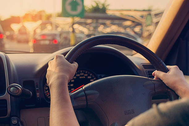 istock Female driving car. Vintage filter 496101460