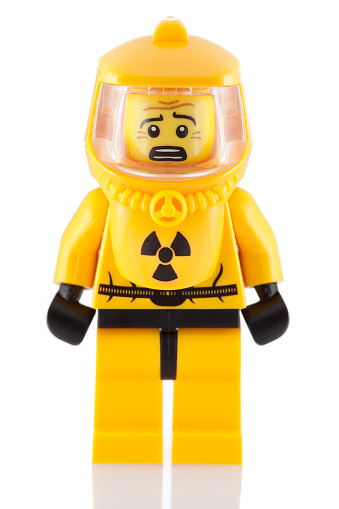 Ljubljana, Slovenia - December 7, 2011: Hazmat Guy figure from the Lego Minifigures series. Lego figures and bricks are world famous small plastic toys produced by the Danish toy manufacturer Lego Group since 1978.
