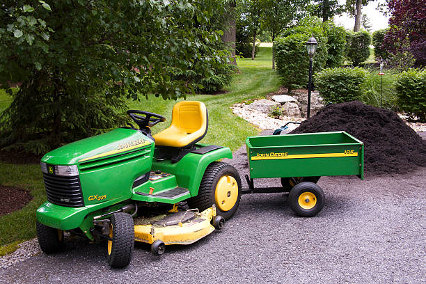 john deere con carro - john deer fotografías e imágenes de stock