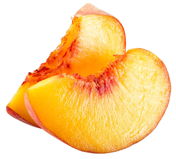 istock Peach slices isolated on white background 496112539