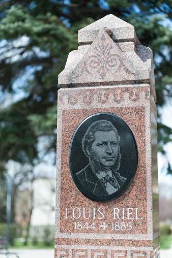 Winnipeg, Manitoba, Canada - May 14, 2009 Louis Riel grave, founder of the province of Manitoba and leader of the Metis in St. Boniface Cathedral Cemetery, Winnipeg, Manitoba