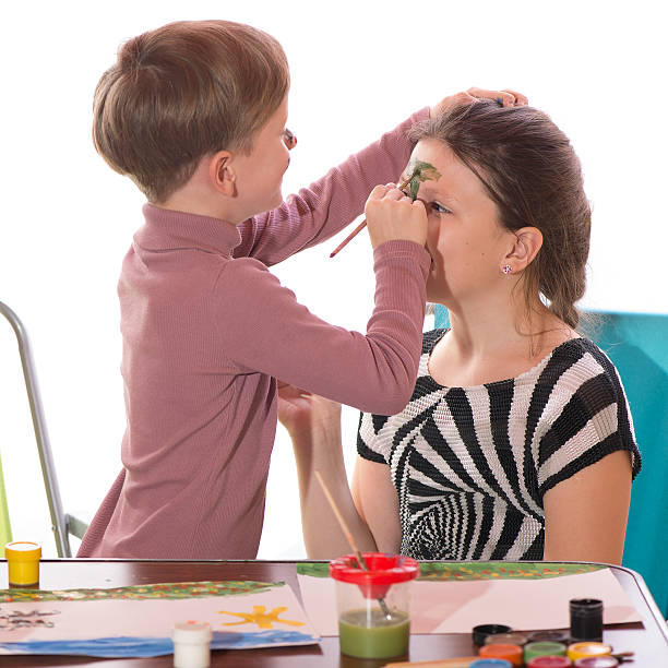 istock Boy and girl paint 496117852