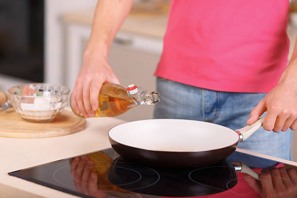 istock Man cooks food in the kitchen 496118452