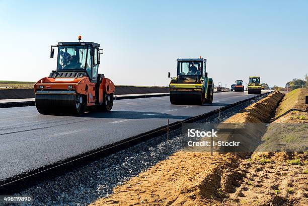 New Road Construction Stock Photo - Download Image Now - Road Construction, Construction Industry, Asphalt