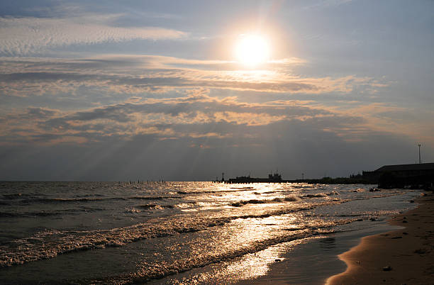Bujumbura, Burundi: Lake Tanganyika - sun over the downtown beach - the deepest lake in Africa - photo by M.Torres
