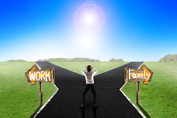istock Business man walking down middle of the road 496122580