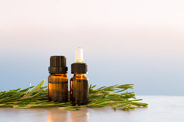 istock Rosemary aromatherapy essential oils in bottles 496122852