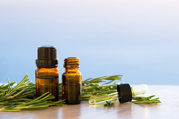 istock Rosemary aromatherapy essential oils in bottles 496123112