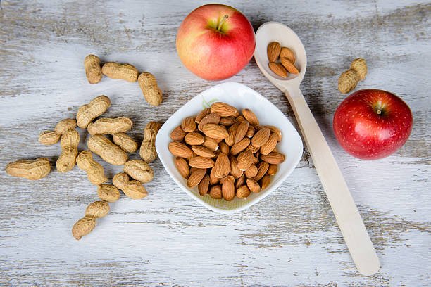 istock Apples and nuts. It can be used as a background 496132666