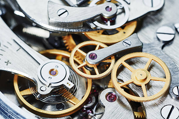 gear clock mechanism Time concept. clock mechanism close-up view. Shallow DOF. clockworks photos stock pictures, royalty-free photos & images