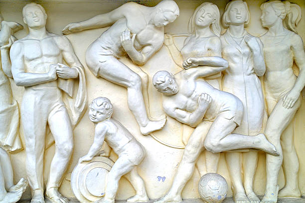 Rostov-on-Don. Russia - April 26, 2010: The bas-relief on the wall of the train station depicting the Soviet people for work and leisure