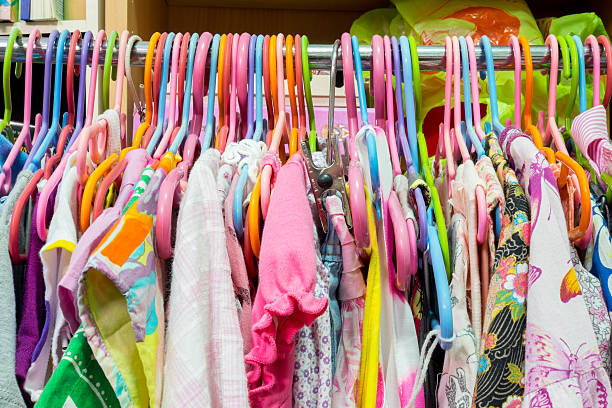 istock Girl cloth on rack 496154884