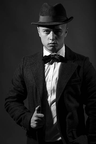 istock Handsome gentleman in suit and hat 496155028