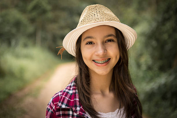 Close-up lifestyle outdoor portrait of a teenage girl