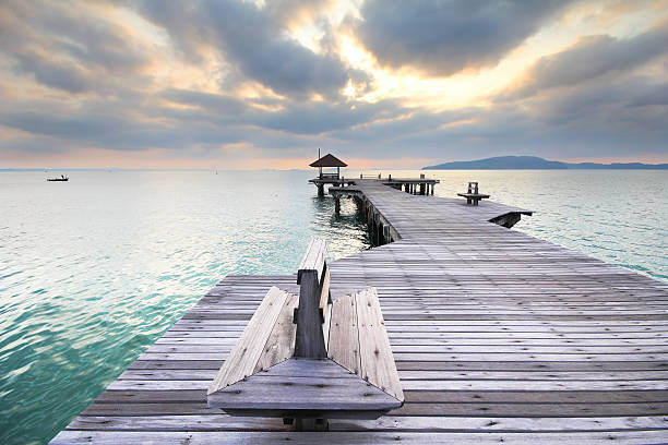 istock Wooden bridge at Rayong 496160031