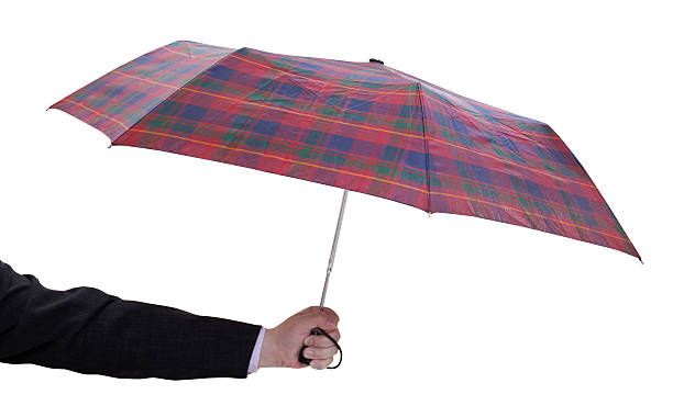 istock male hand with small open telescopic umbrella 496160079
