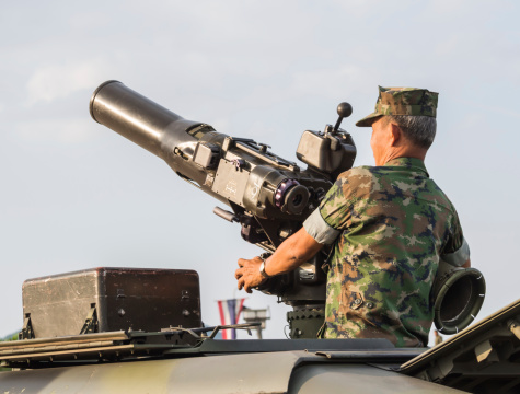 Chonburi, Thailand - January 18, 2014: Unidentified marine with armored vehicle and cannon performing military parade of Royal Thai Navy at Sattahip Naval Base, Chonburi, Thailand