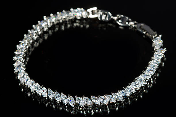 istock silver bracelet with diamonds on black background 496160770