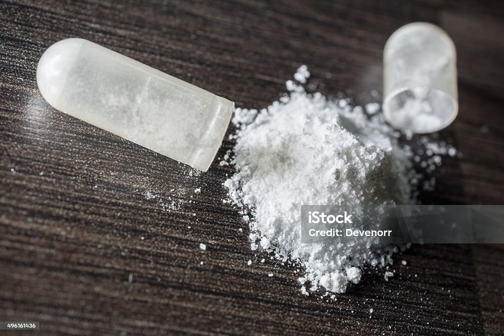 Macro Of An Opened White Medicine Capsule White Color Stock Photo